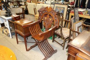 A Savonarola type brass inlaid chair