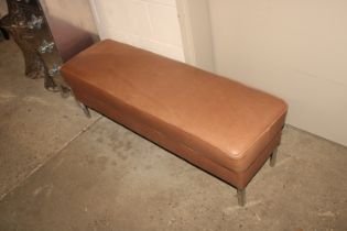 A Foot Stools and More long tan leather and alumin