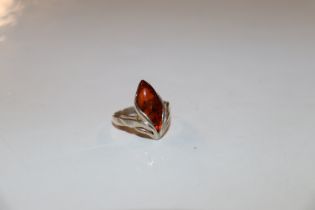 A sterling silver & amber bud ring of Art Deco sty