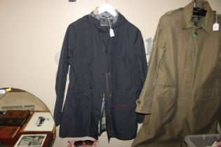 A size 16 tartan Barbour dress jacket