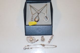 A collection of sterling silver cultured pearl, diamond and white gem stone set necklaces and