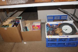 Two boxes of various books and two further boxes of kitchen utensils