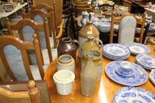 A quantity of various stoneware flagons and jars t