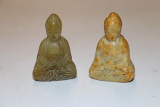 Two carved Jade type Buddhas