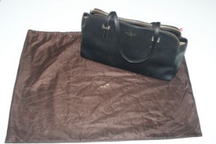 A Kate Spade black leather large handbag with dust