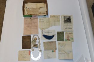 A box of assorted military ephemera, photos etc