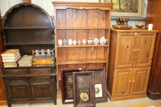 A hardwood open fronted bookcase fitted four shelv