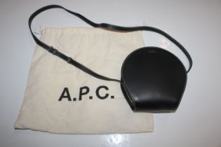 An A P C black leather constructed evening bag and
