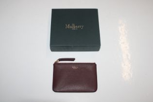 A Mulberry wine leather coin purse in box