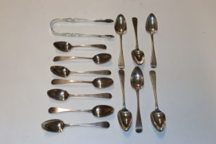 A set of six silver teaspoons, another set of six silver teaspoons, a single silver teaspoon and