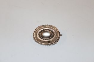 A Victorian silver roundel brooch