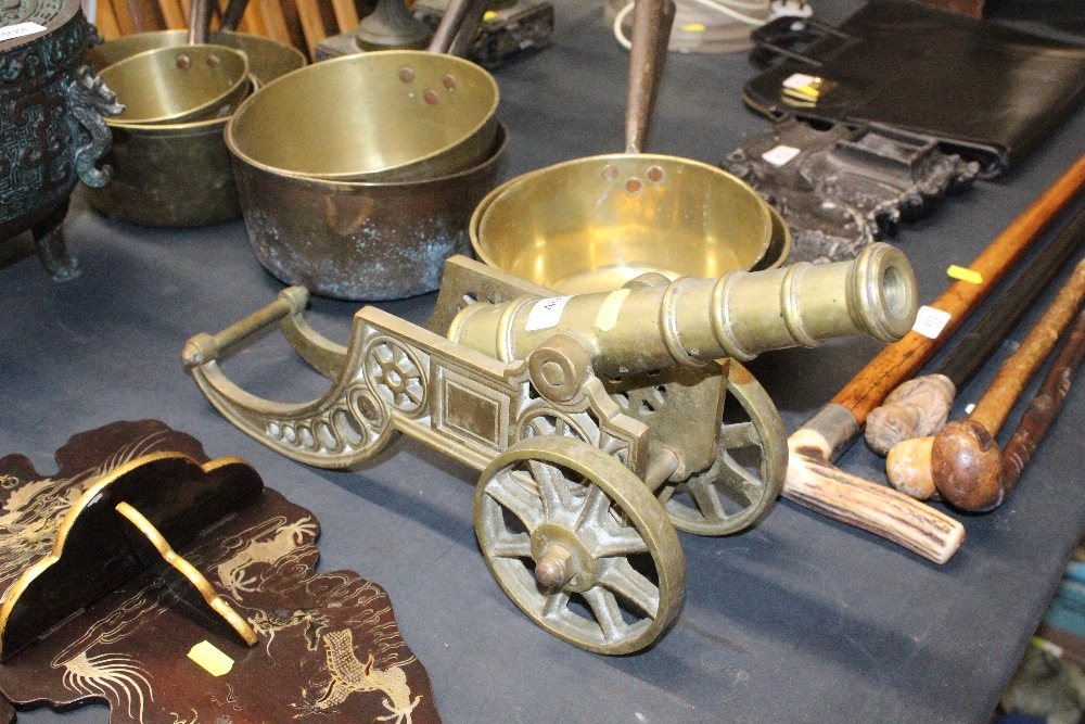 A brass model canon