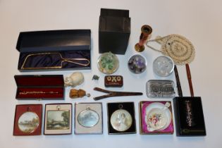 A boxed presentation hacksaw, miniature model of a flute, various prints, beadwork evening bag,