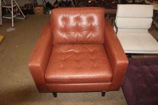 A Poltrona tan leather armchair in the Kennedee pa