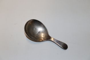 A silver caddy spoon, hallmark Sheffield 1912