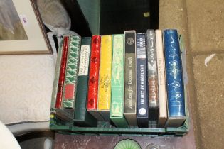 A crate containing 12 Folio Society books