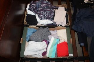 Two boxes containing various lady's outer wear to include Uniglo