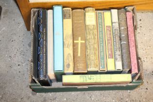 A box containing 12 Folio society books