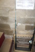 A two piece Leader spin 7' fishing rod and two oth