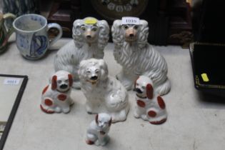 A pair of Staffordshire dogs and four Staffordshir