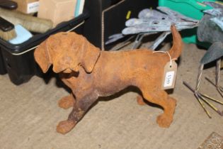 A cast iron statue in the form of a puppy (103)