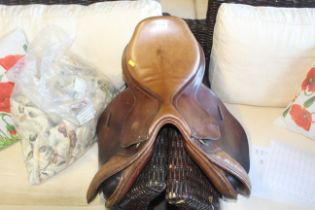 A leather horse riding saddle