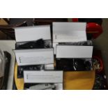 Five boxes of heated motorcycle gloves and socks