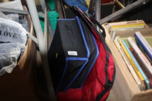 Two photo albums and a suit bag