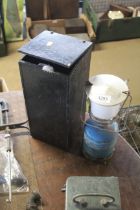 A camping gas carry lantern with wooden carry case