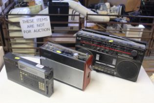 A Toshiba radio, a Hacker Harrier radio and a Sony