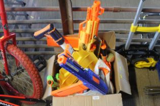 A quantity of various Nerf guns, toys guns and var