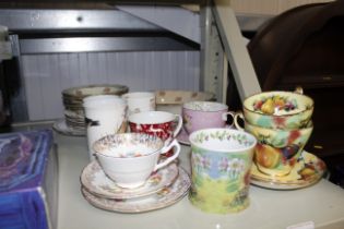 A collection of various patterned teaware to inclu