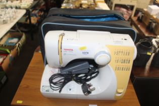 A Toyota model STF92 electric sewing machine with