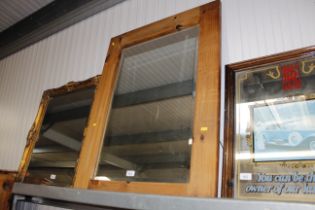 A large pine framed bevel edged mirror