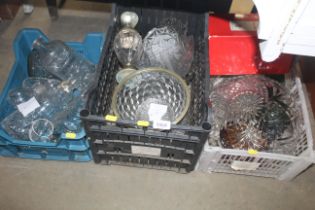 Three plastic crates of various table glassware in
