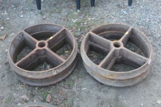 A set of four four spoke shepherds hut wheels