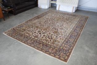 An approx. 11'3 x 8'4" floral patterned rug AF