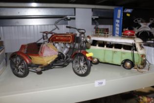 A model of a VW camper van with side awning together with a model motorcycle and sidecar