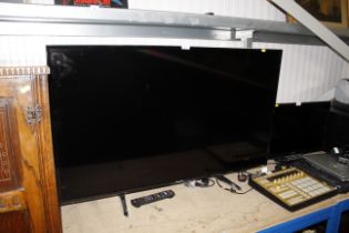 A Panasonic TX-49DX600B LED 49" television with re