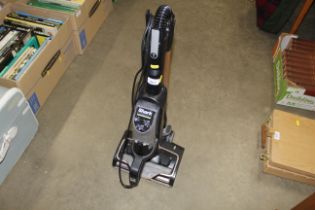 A Shark folding vacuum cleaner