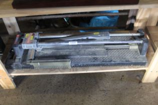 A Plasplugs power glide tile cutter