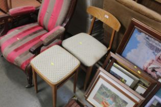 A matching vintage stool and kitchen chair