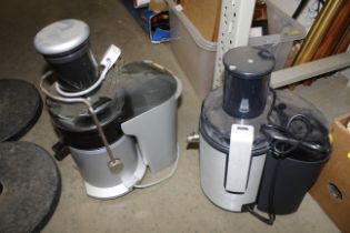 Two electric juicers