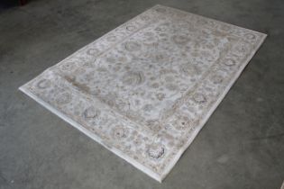 An approx. 7'9 x 5'3" floral patterned rug