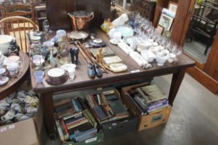 An Edwardian extending dining table with winding h