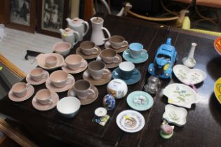 A collection of Poole twin tone tea ware, a VW bee