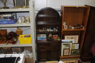 An arched top oak dresser