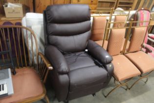 An electric reclining armchair