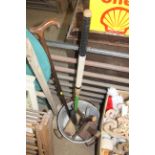 Two metal cooking pots, a walking stick, a mallet,