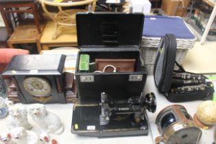 A Singer 221K sewing machine in fitted case